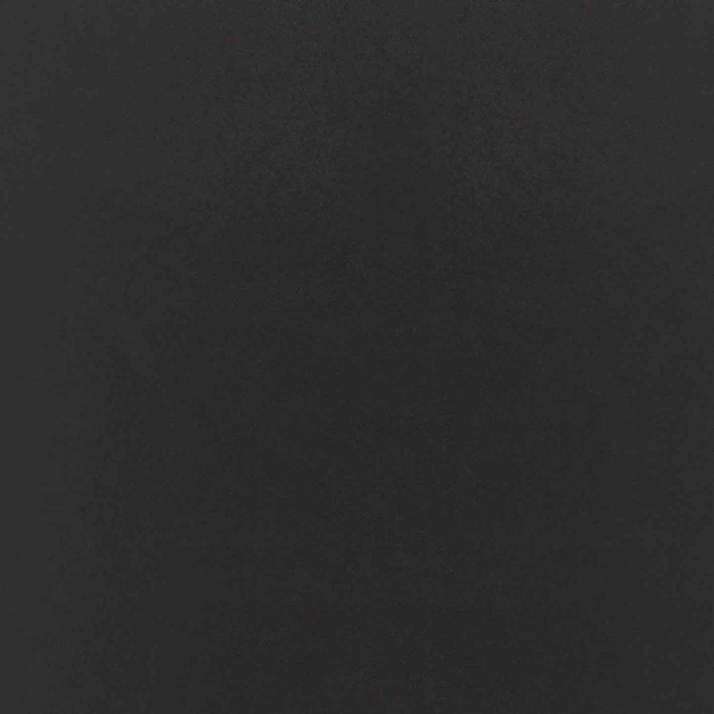 Close-up of black leather upholstery with detailed horizontal stitching pattern