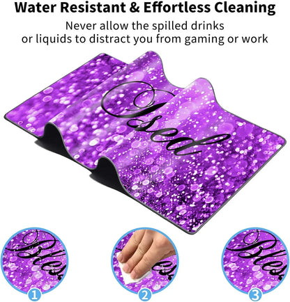 Purple glittery gaming desk mat with word 'Pixel', water resistant surface shown being wiped clean