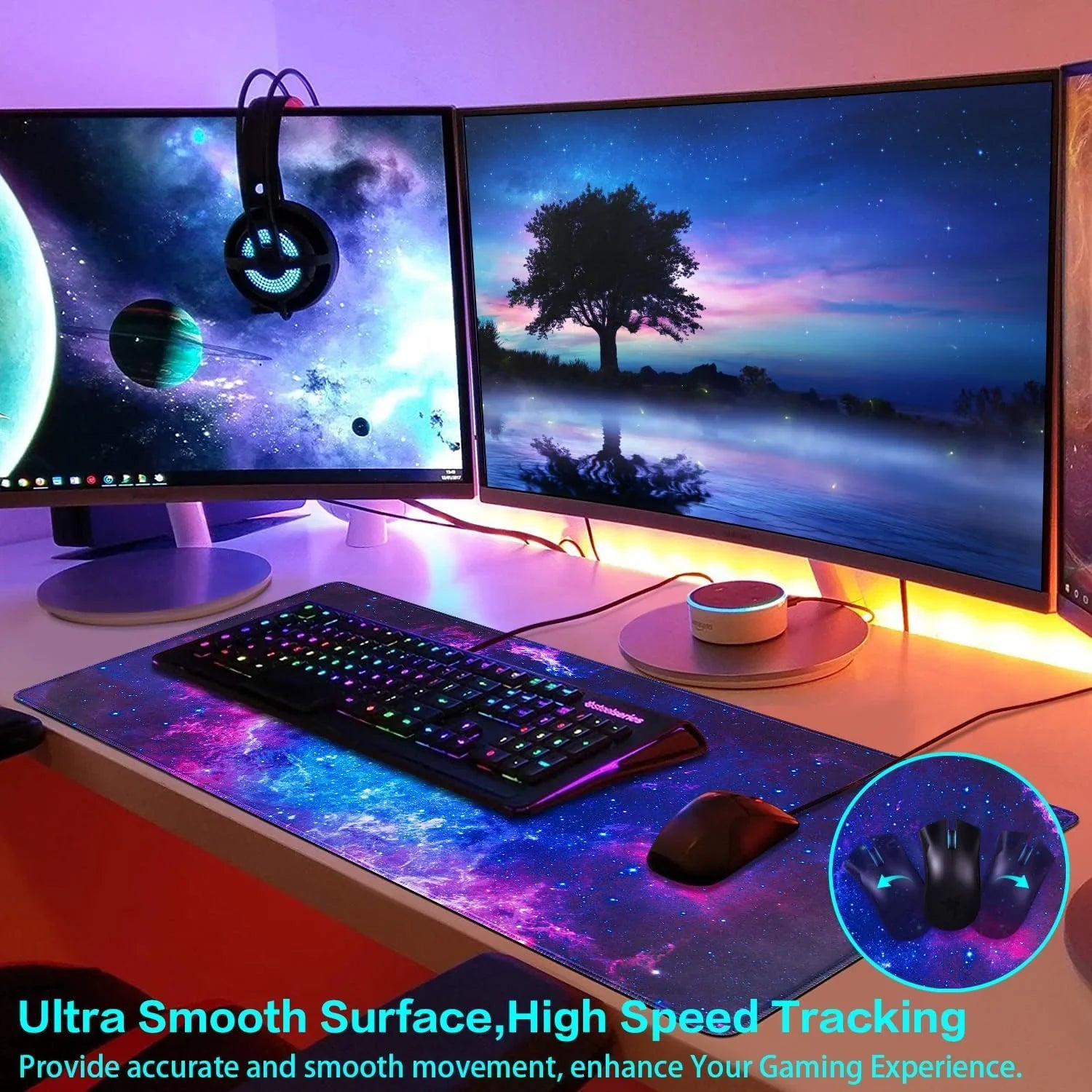 RGB gaming keyboard and mouse on large galaxy-themed mousepad with dual monitors showing space and tree landscape, LED lighting