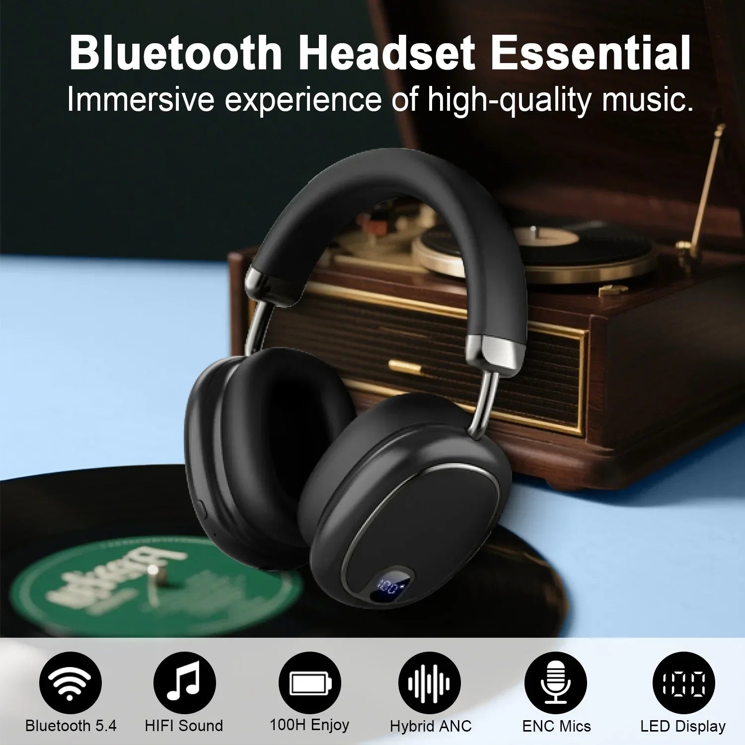Black Bluetooth wireless headset with LED display, placed near vintage record player and vinyl on blue surface
