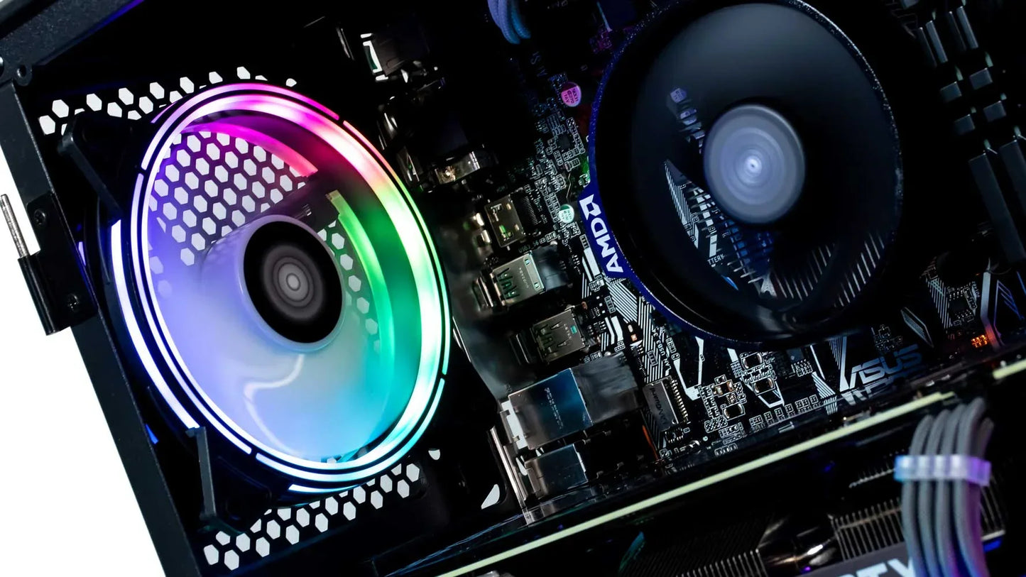 Gaming PC interior with RGB cooling fan, AMD motherboard, and ASUS components in computer case