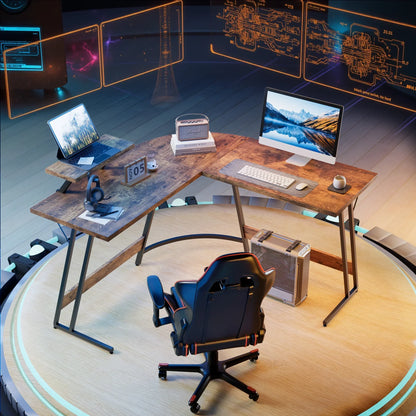 Modern office setup with L-shaped wooden desk, computer, laptop, gaming chair, and holographic interface
