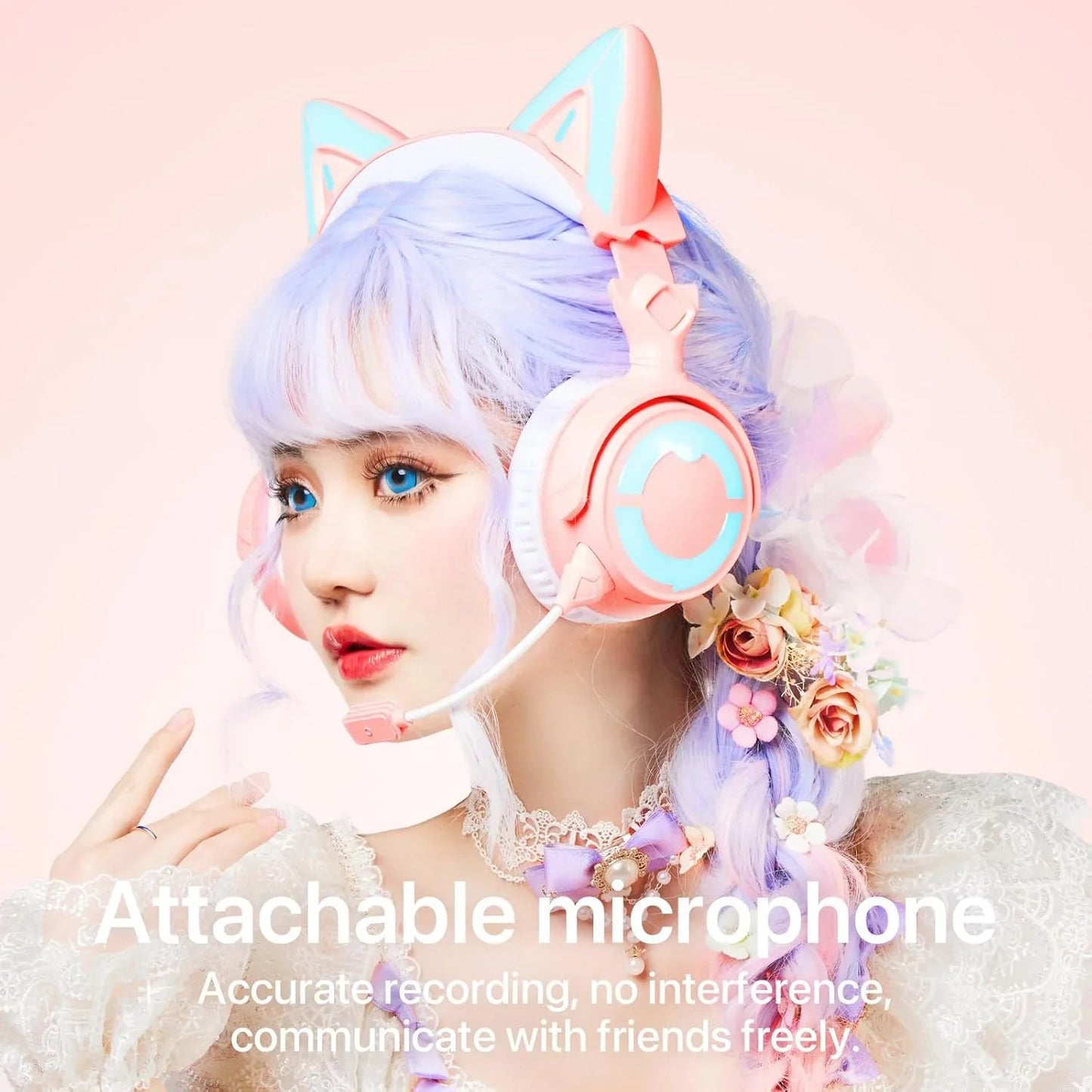 Young woman with pastel purple hair and floral accessories wearing pink cat ear gaming headset with attachable microphone