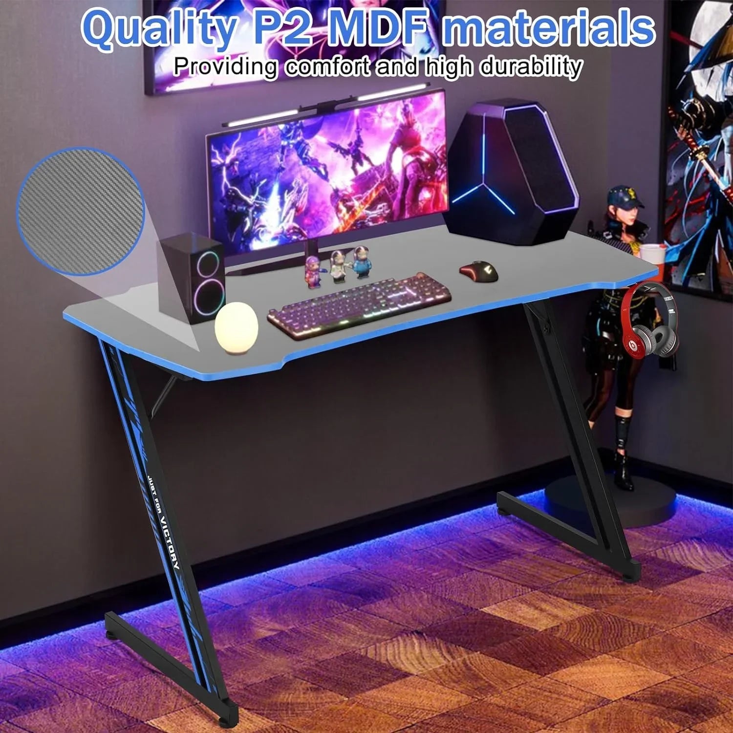 Gaming desk with quality P2 MDF material, RGB keyboard, mouse, speakers, and gaming PC in stylish room