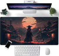 Gaming desk setup with wide mousepad featuring samurai silhouette and full moon in Japanese village art