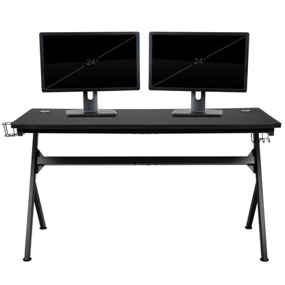 Black gaming desk with dual 24-inch monitors, cup holder, and headphone hook on white background