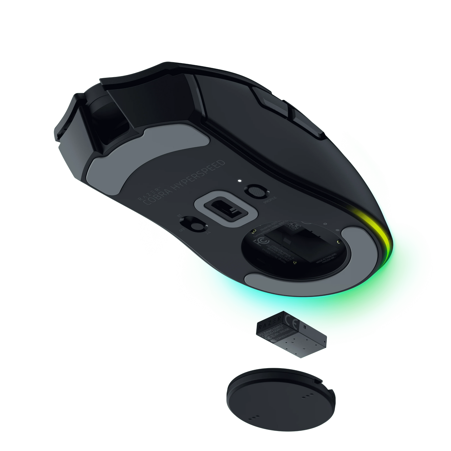 Bottom view of black Razer Cobra Hyperspeed gaming mouse with USB dongle and battery removed, glowing green light