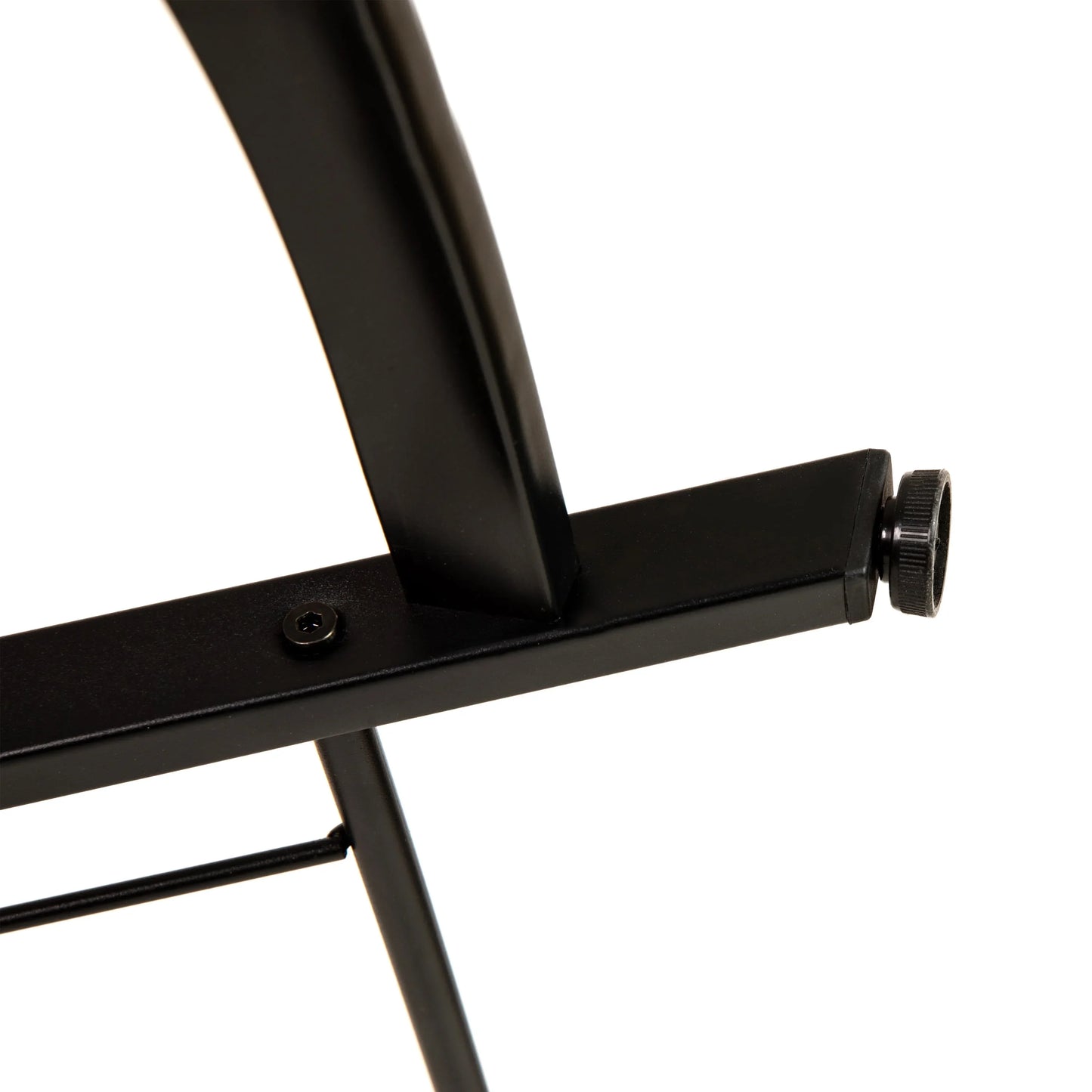 Close-up of black metal frame joint with screw and adjustable foot on white background