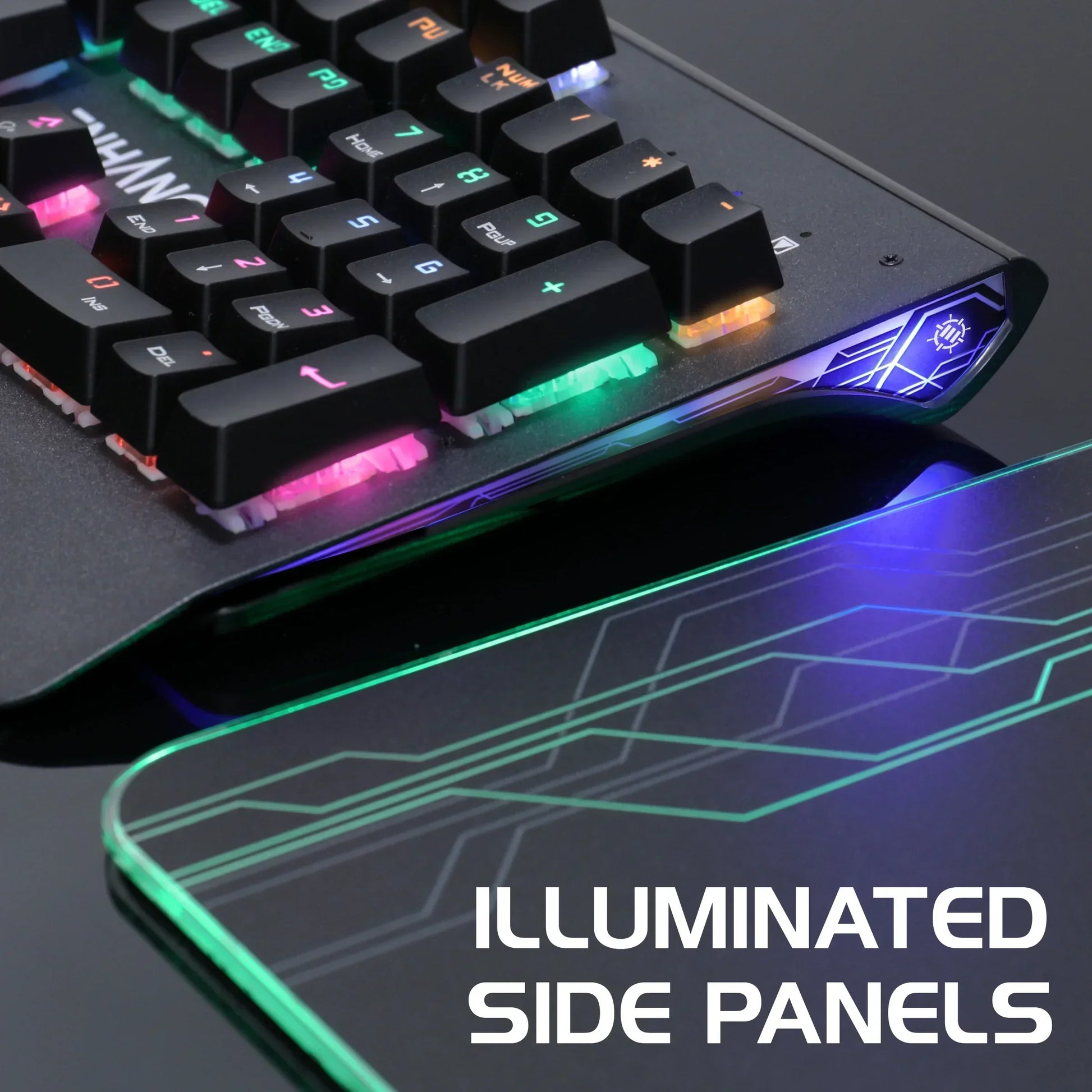 RGB gaming keyboard and mousepad with illuminated side panels on glossy black desk