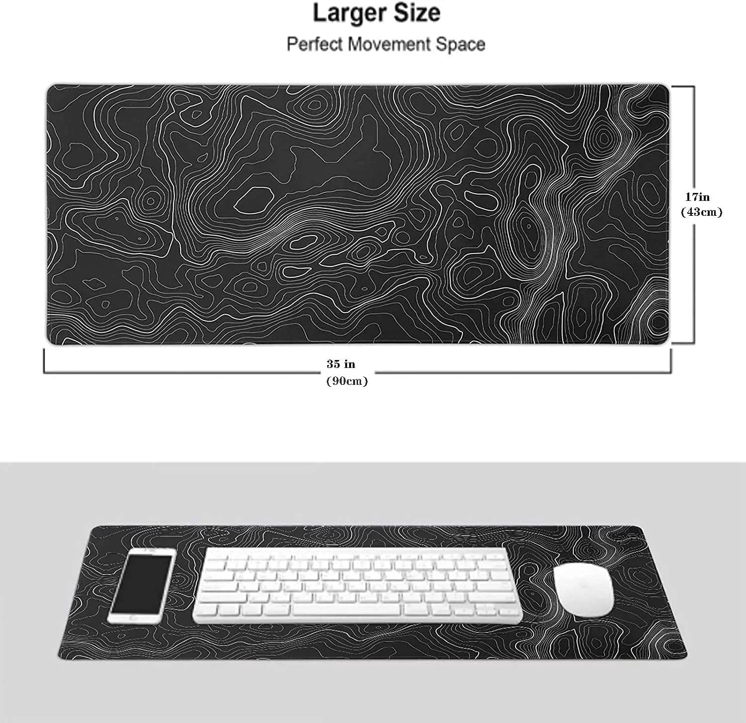 Black large gaming desk mat with white contour map design, 35x17 inches, holding keyboard, mouse, phone