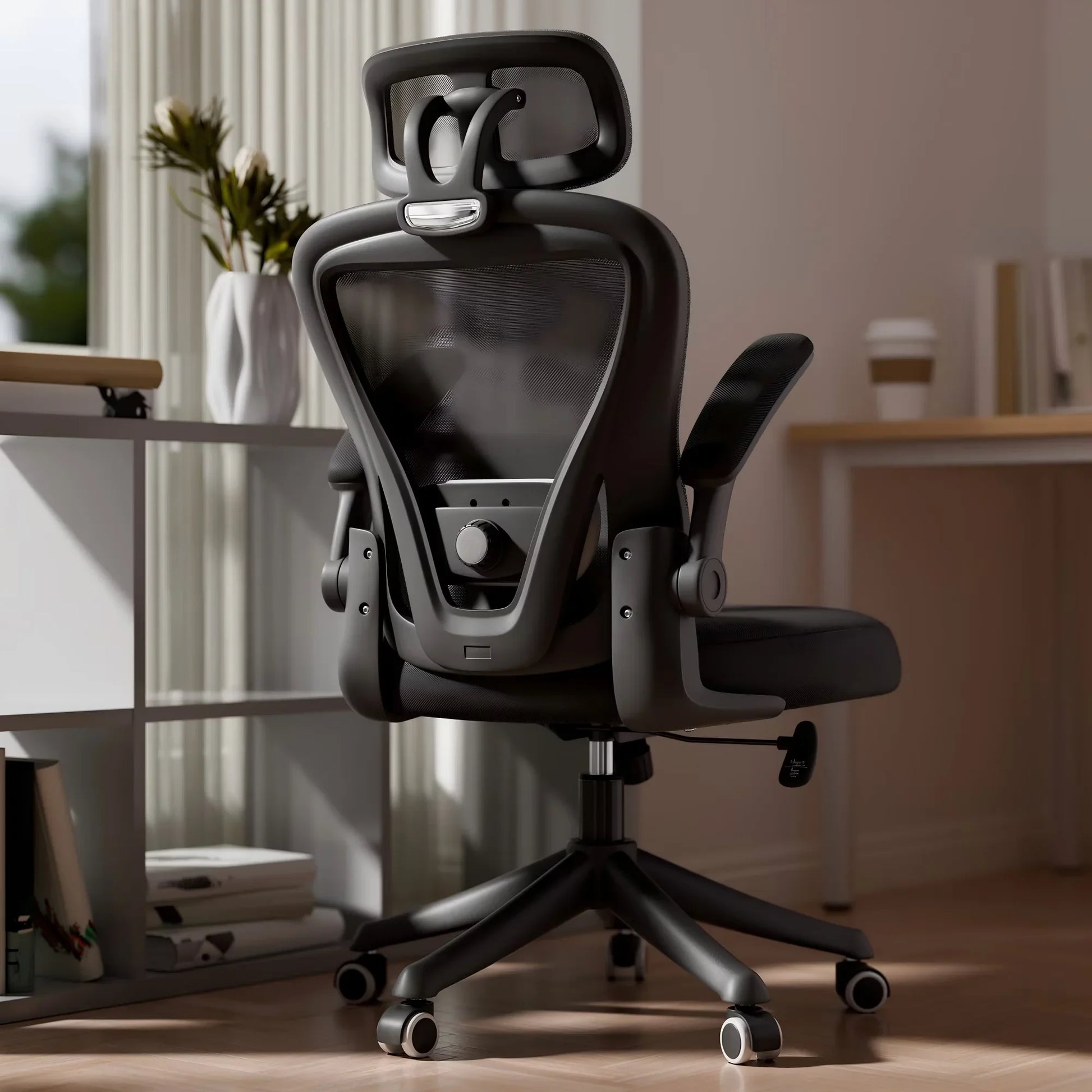 Ergonomic gaming chair with mesh back, adjustable headrest, and lumbar support in modern home office setup