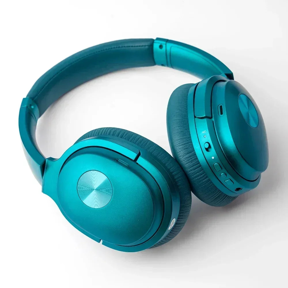 Teal over-ear wireless gaming headset with cushioned ear pads on white background