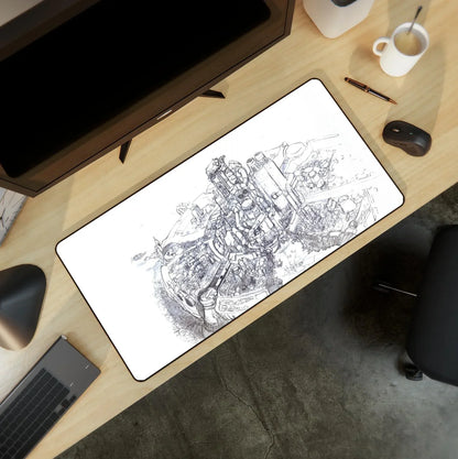Modern desk setup with a wide gaming mouse pad featuring intricate black and white cityscape art, computer monitor, wireless mouse, keyboard, pen, and coffee cup