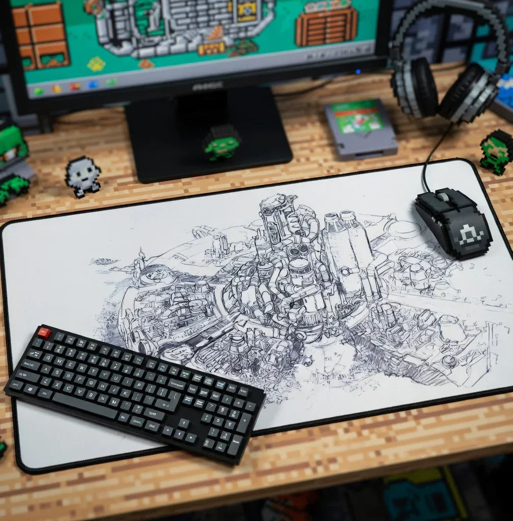 Retro gaming desk setup with 8-bit keyboard, pixel mouse, illustrated mouse pad, and gaming accessories