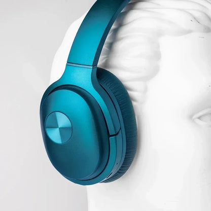 Blue over-ear gaming headset on white mannequin head, minimalist background