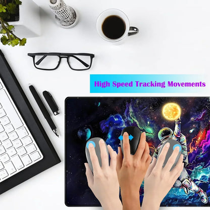 Desk setup with white keyboard, black glasses, pen, coffee cup, and tablet displaying astronaut space art and text 'High Speed Tracking Movements'
