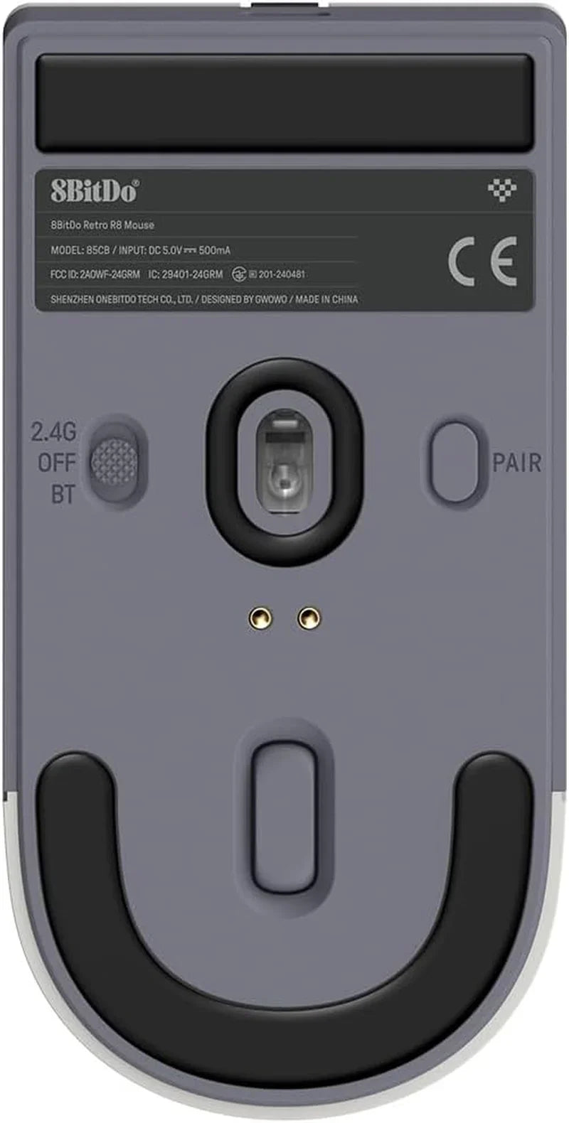 Bottom view of retro 8BitDo wireless gaming mouse with sensor, switches, and rubber grips
