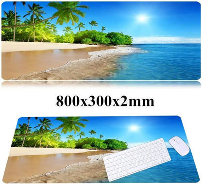 Large 800x300x2mm desk mouse pad featuring a tropical beach scene with palm trees, sandy shore, and bright sun