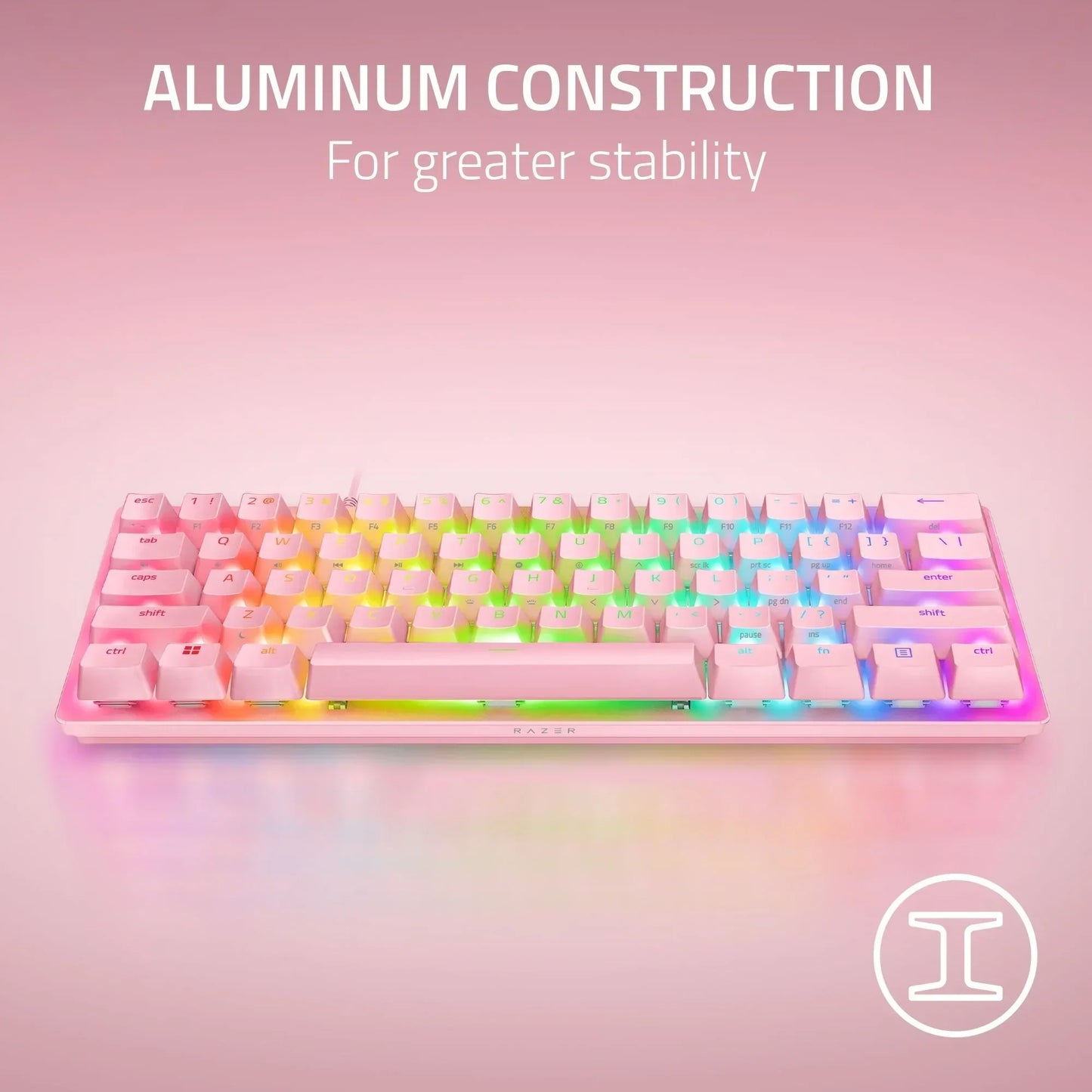 RGB backlit pink gaming keyboard with aluminum construction on pastel background, Byte Style