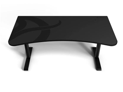 Black curved gaming desk with sturdy metal legs and subtle design on desktop