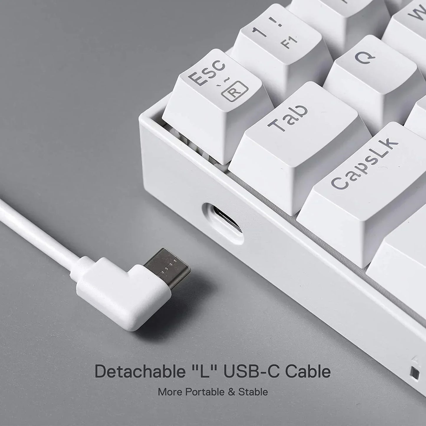 White mechanical keyboard with detachable L-shaped USB-C cable, modern gaming gear from Byte Style