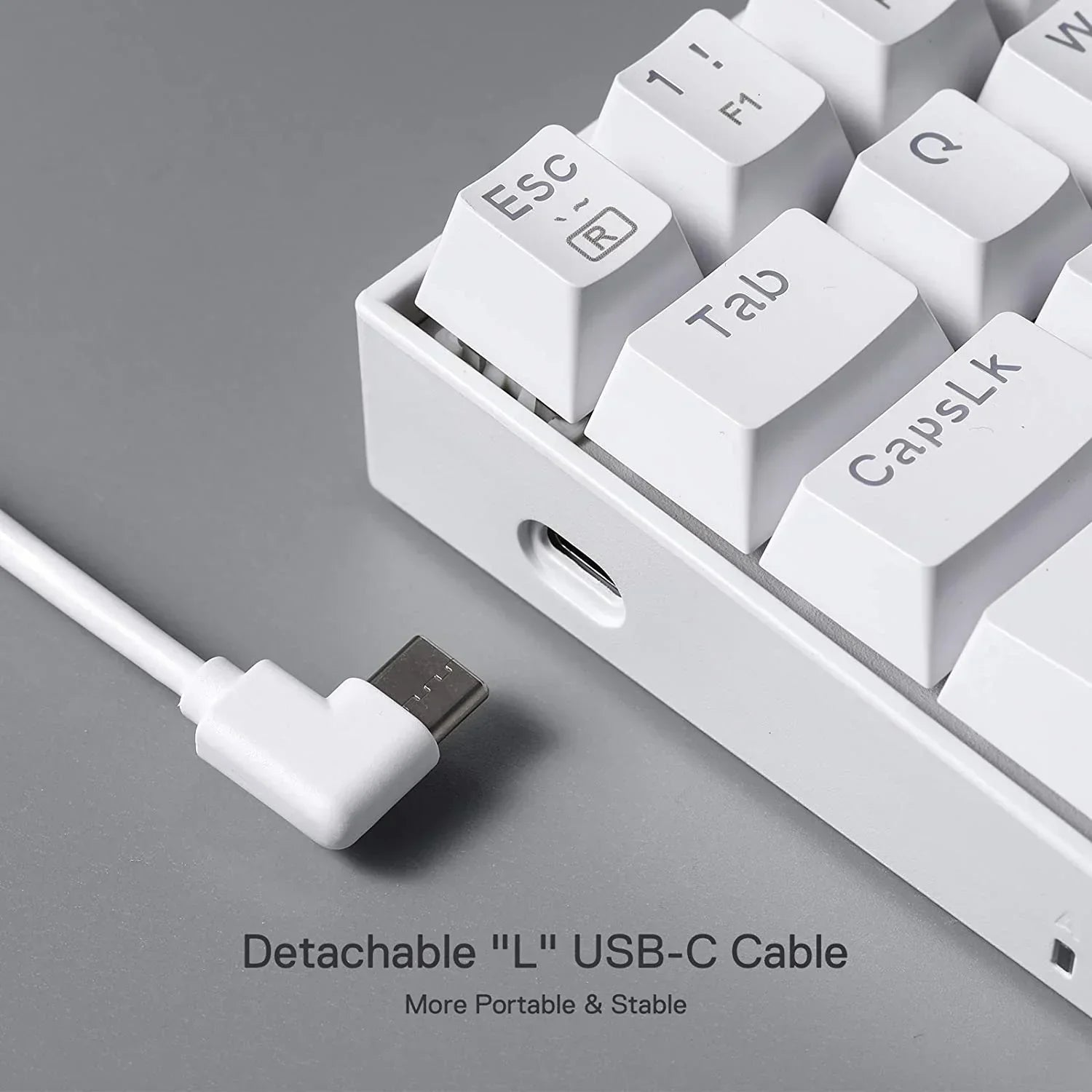 White mechanical keyboard with detachable L-shaped USB-C cable, modern gaming gear from Byte Style