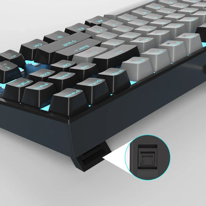 Close-up of RGB mechanical gaming keyboard with adjustable feet, retro 8-bit design by Byte Style.