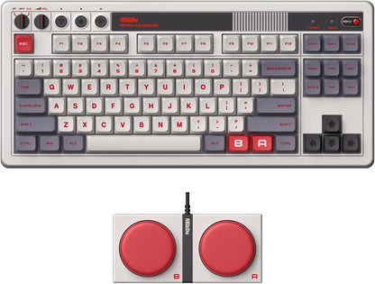 Retro-themed gaming keyboard and dual button accessory with red and gray 8-bit style keys.