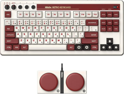 Retro 8-bit style mechanical keyboard with Japanese keycaps and matching circular button accessory.