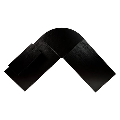 Black textured wooden L-shaped corner trim piece on white background