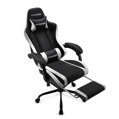 Black and white GT Racing ergonomic gaming chair with footrest and adjustable cushions