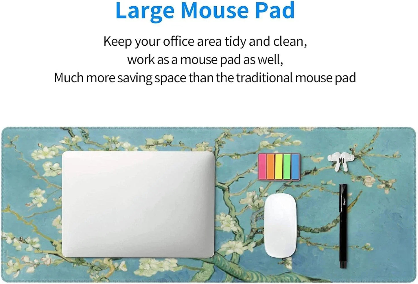 Large blue floral-themed desk mouse pad with a laptop, wireless mouse, colorful sticky notes, pen, and wireless earbuds