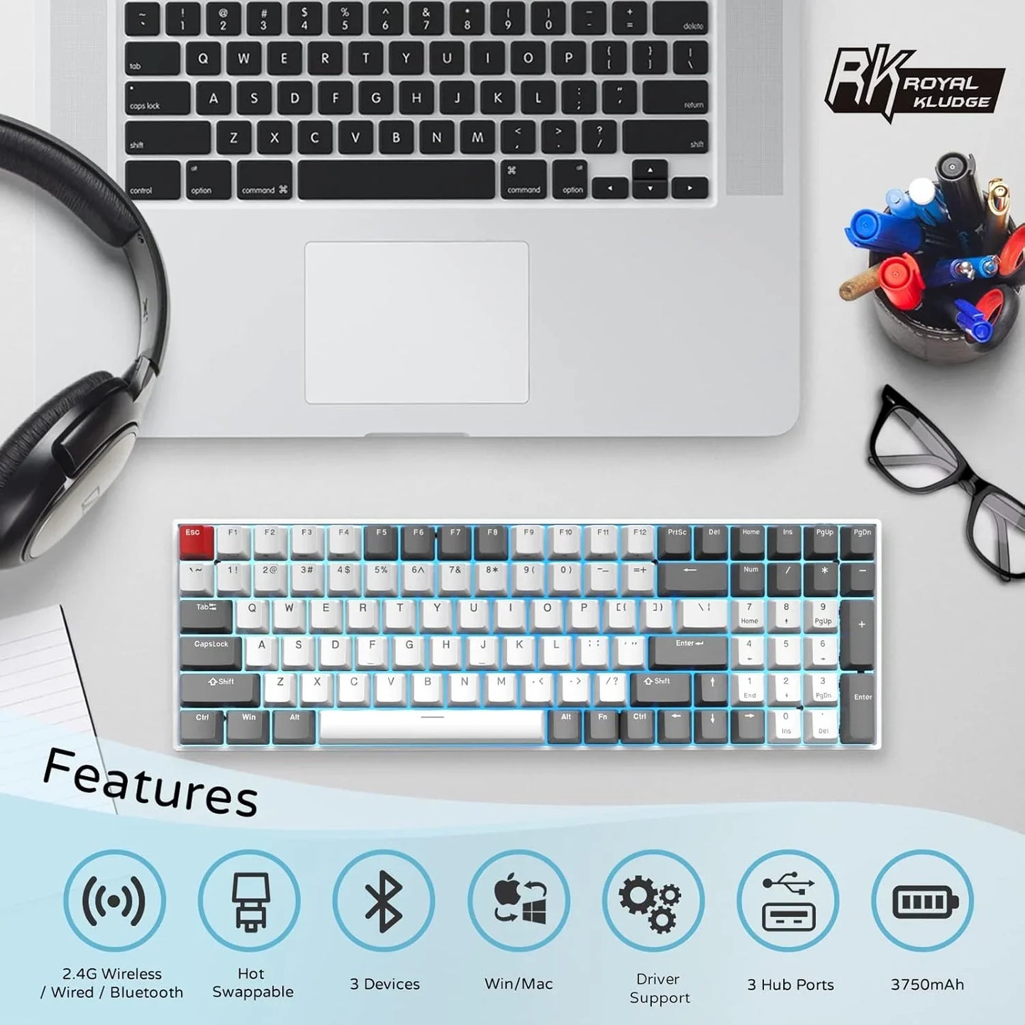 Mechanical keyboard with RGB backlight, wireless Bluetooth, hot swappable keys, shown with laptop, headset, glasses, and pens