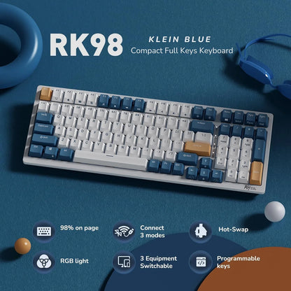 RK98 Klein Blue compact full keys mechanical keyboard with blue, white, and mustard keycaps on blue surface