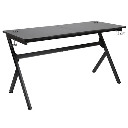 Black modern gaming desk with metal frame, headphone holder, and cup holder