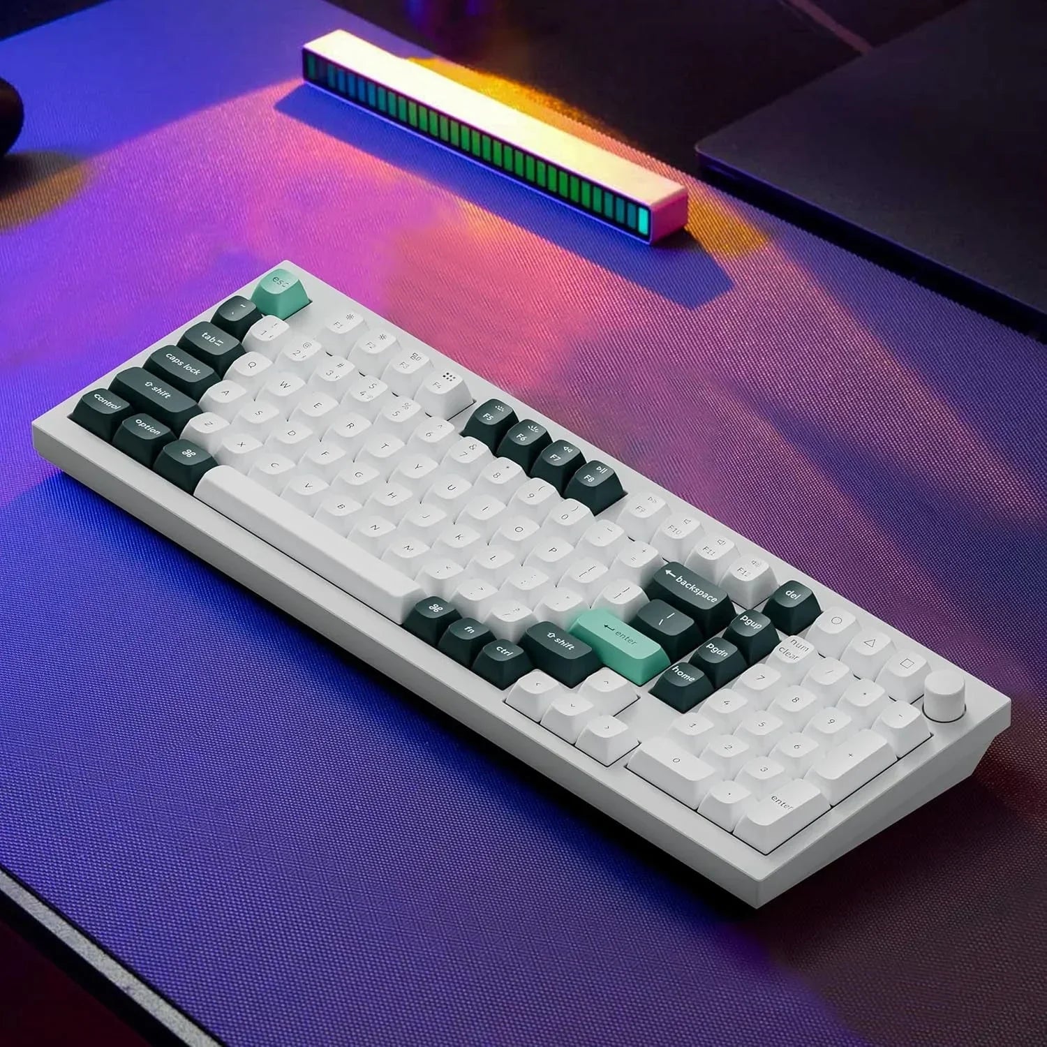Retro 8-bit style gaming keyboard with RGB bar on modern gaming desk, Byte Style gear