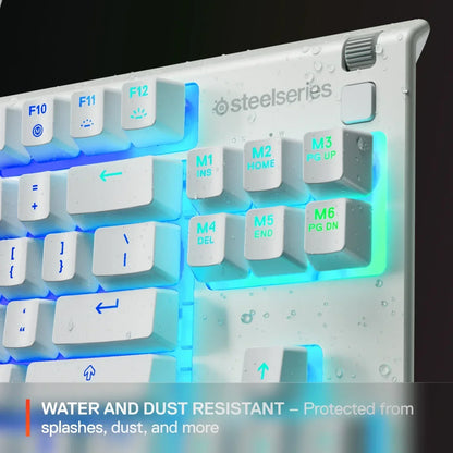 White SteelSeries gaming keyboard with RGB lighting and water droplets, water and dust resistant