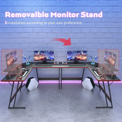 Modern gaming desk setup with removable monitor stand, multiple screens, RGB lighting, and gaming accessories