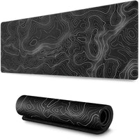 Black extended gaming mouse pad with white abstract contour map pattern, shown flat and rolled