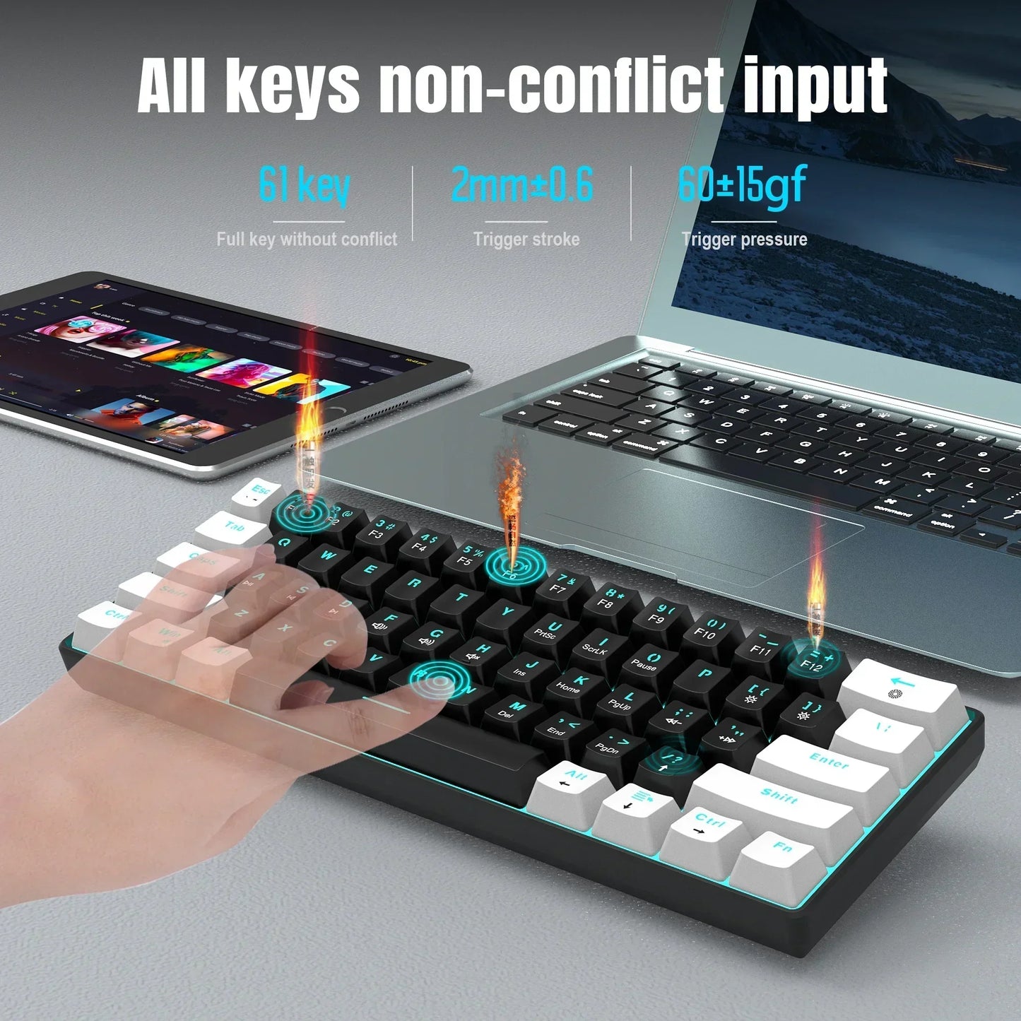 Compact mechanical keyboard with 61 keys, shown beside a laptop and tablet on a desk, Byte Style gaming gear.