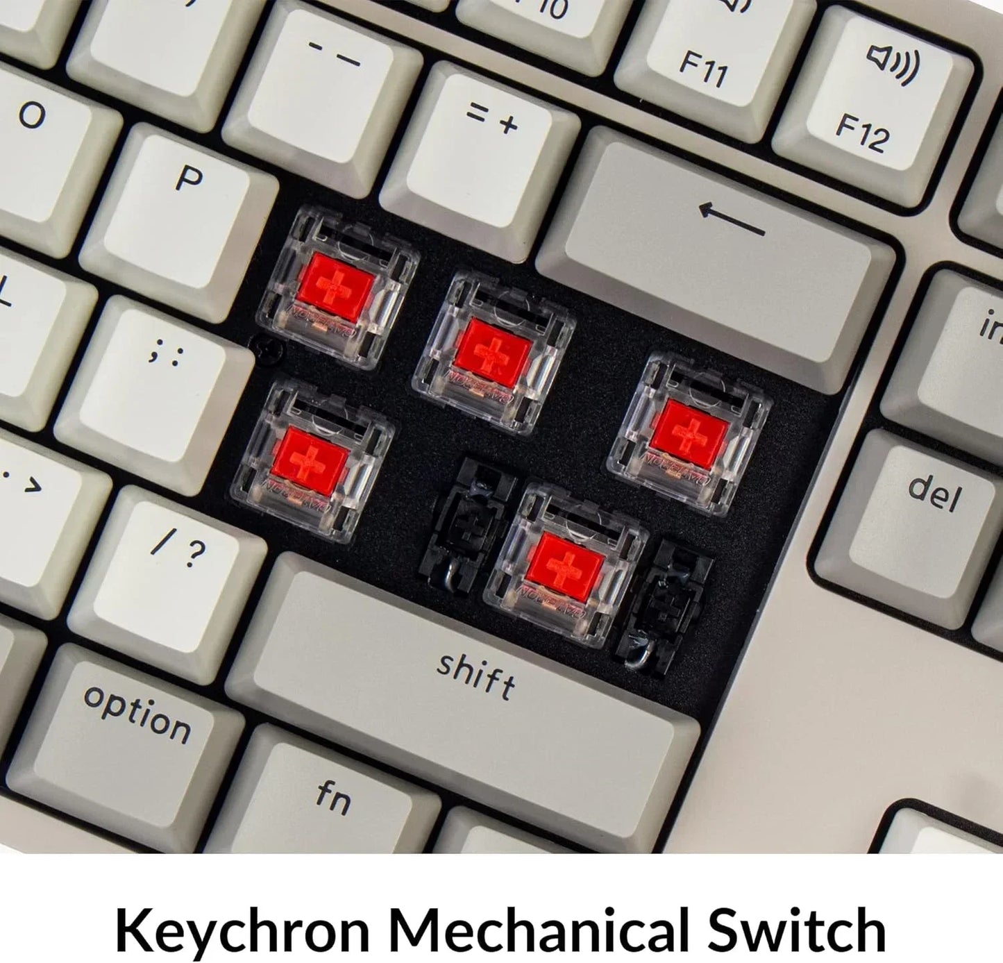 Keychron mechanical keyboard with exposed red switches on white keycaps, modern gaming gear