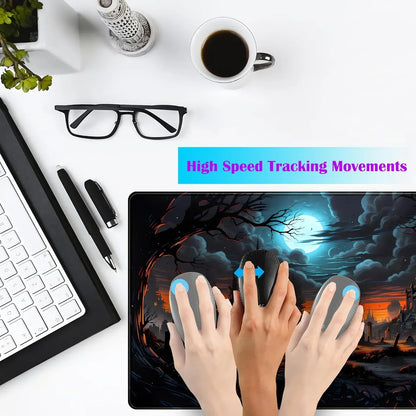 Gaming mousepad with fantasy night scene design showing hands demonstrating high speed tracking movements on white desk with keyboard, glasses, and coffee