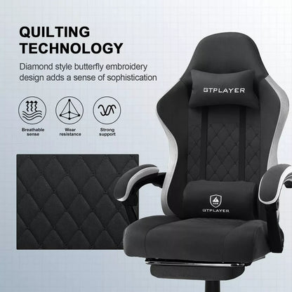 Black GTPLAYER gaming chair with gray accents, diamond quilted upholstery, lumbar and neck support pillows