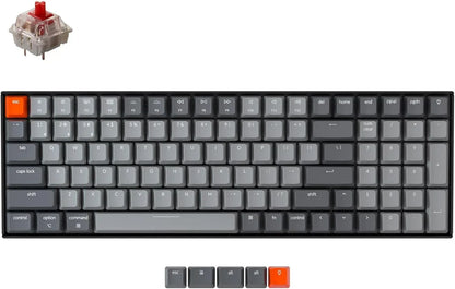 Retro-inspired mechanical keyboard with gray keycaps, orange escape key, RGB switch, and extra keycaps