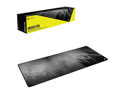 Corsair MM350 Pro premium cloth gaming mouse pad with black textured surface and logo, next to yellow and black box
