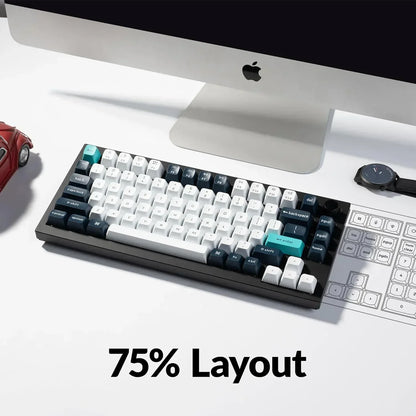 Byte Style 75% layout mechanical keyboard on a modern gaming desk with a Mac computer.