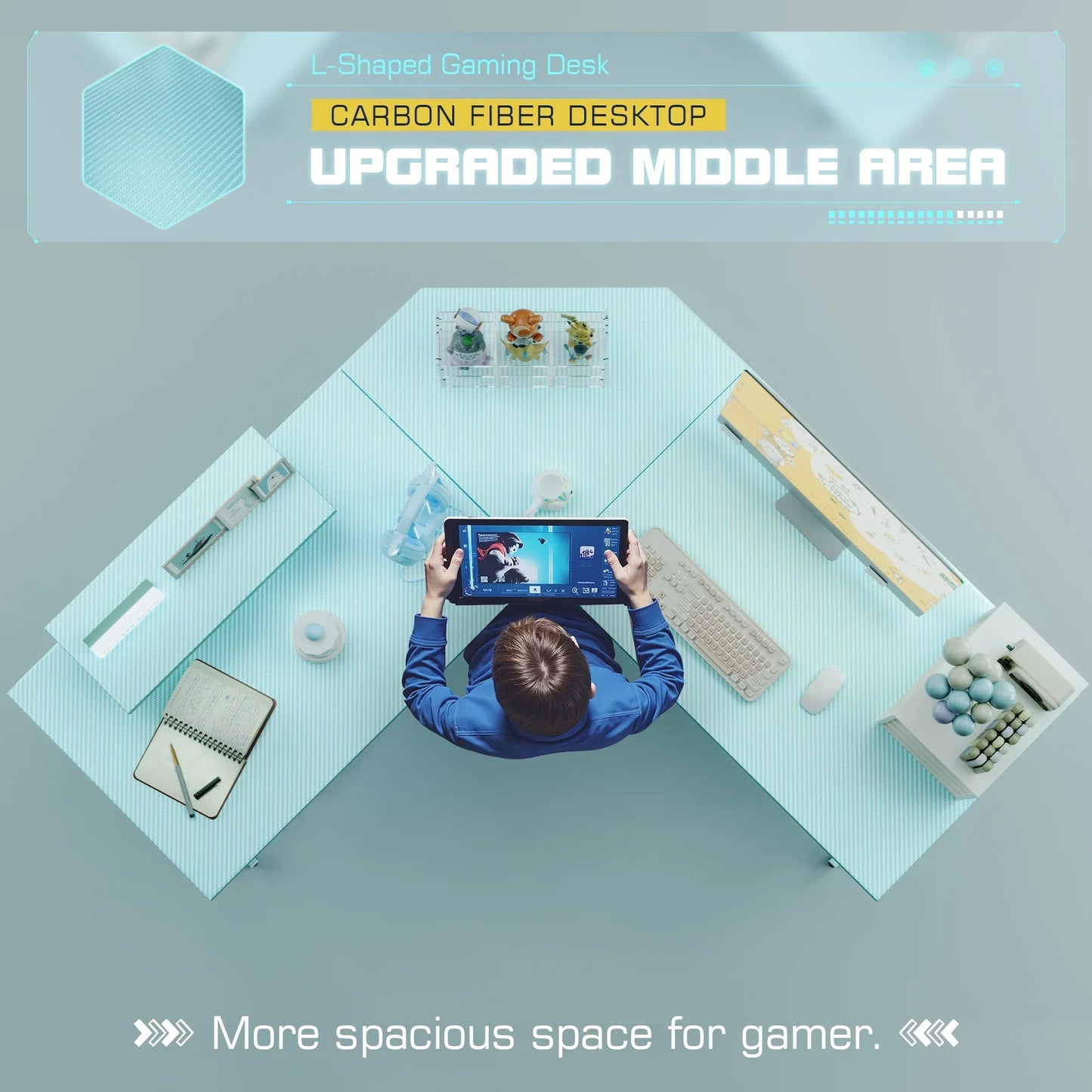 Top view of person holding tablet at L-shaped gaming desk with carbon fiber desktop and gaming setup