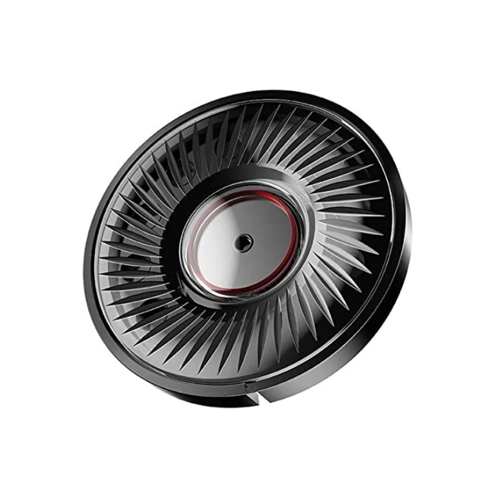 Close-up of a black gaming headset speaker driver on white background