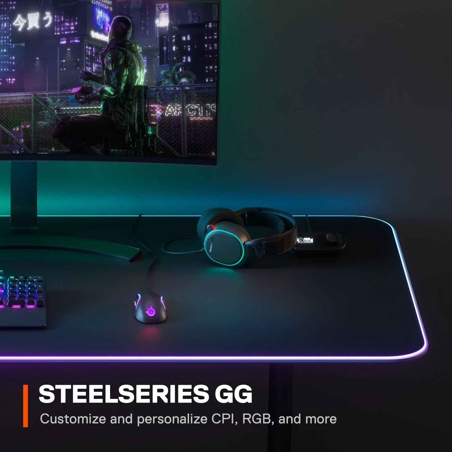 RGB gaming desk setup with PC monitor, SteelSeries mouse, headset, and customizable RGB lighting
