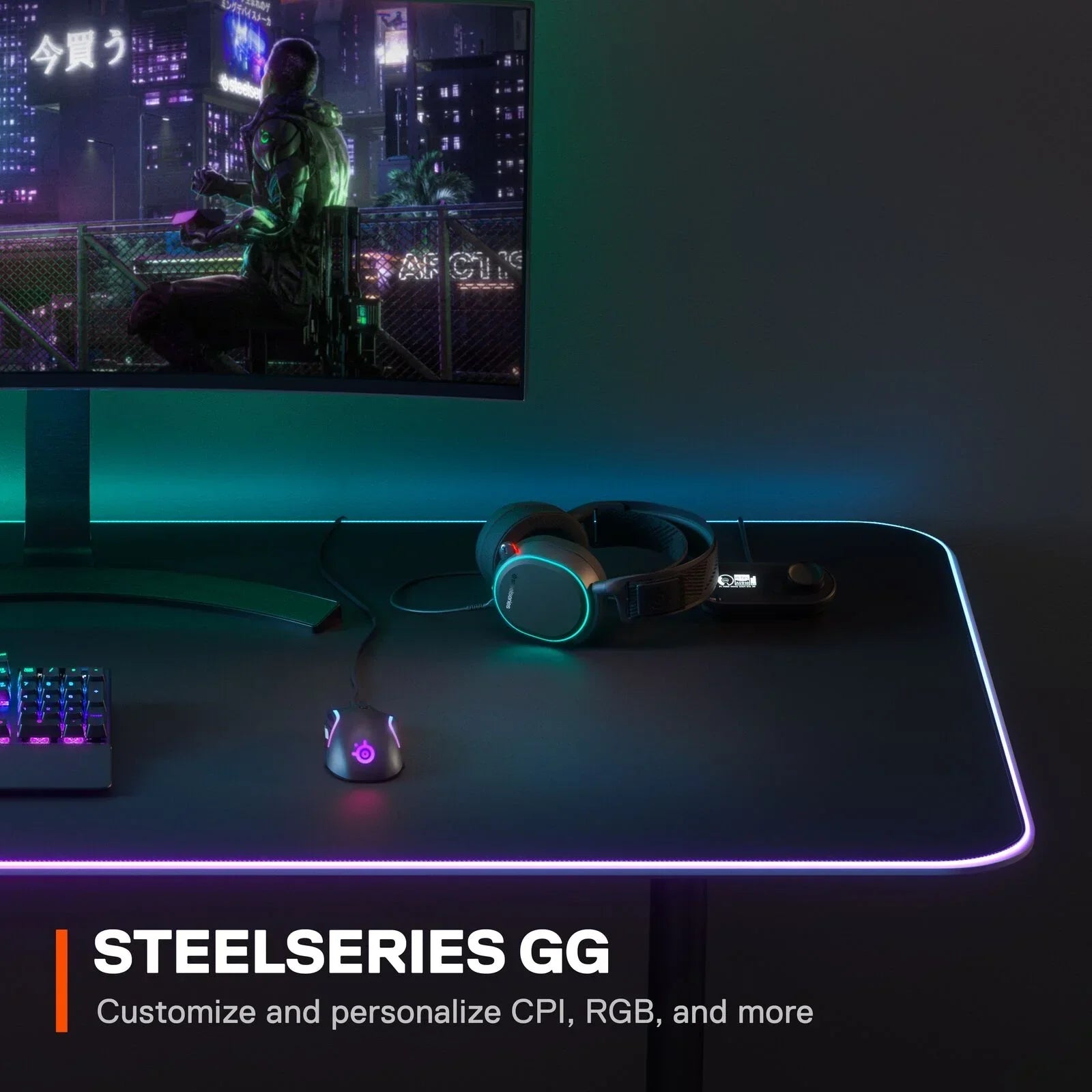 RGB gaming desk setup with PC monitor, SteelSeries mouse, headset, and customizable RGB lighting